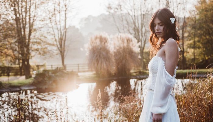 boho bride outside in sunset