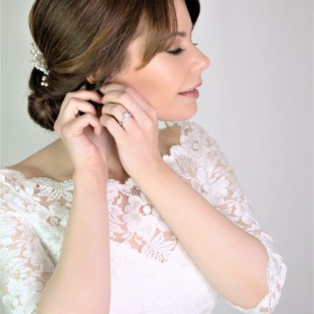 Bride getting ready, hair and makeup by Storme